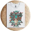 1-1-6.webp Boho Serape Turquoise Aztec Cow Skull T-Shirt – Western Cowgirl Graphic Tee – Vintage Bull Skull Rodeo Shirt – Country Outfit Top