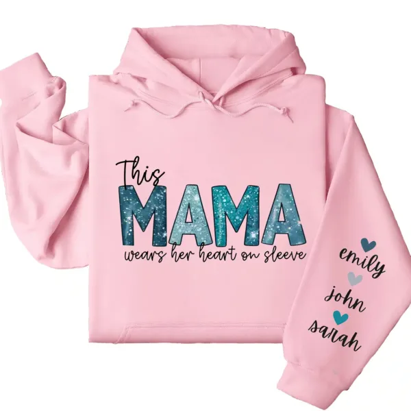 This Mama Wears Her Heart on Her Sleeve Hoodie  – Custom Mom Shirt with Kids’ Names, Personalized Mother’s Day Gift Idea