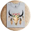 17-3-2.webp Cow Skull with Feathers and Pink Roses T-Shirt – Boho Western Floral Graphic Tee – Country Cowgirl Shirt for Women