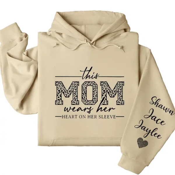 18-1-5.webp This Mom Wears Her Heart on Her Sleeve Hoodie – Personalized Mom Life Shirt with Kids’ Names, Mother’s Day Gift, Cute Blessed Mama Tee