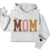 This Mama Wears Her Heart on Her Sleeve Hoodie – Custom Hoodie with Kids’ Names, Personalized Mother’s Day Gift for Mama