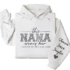 19-1-5.webp This Nana Wears Her Heart on Her Sleeve Hoodie – Personalized Grandma Shirt with Grandkids’ Names, Mother’s Day or Valentine’s Gift