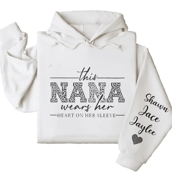 19-1-5.webp This Nana Wears Her Heart on Her Sleeve Hoodie – Personalized Grandma Shirt with Grandkids’ Names, Mother’s Day or Valentine’s Gift