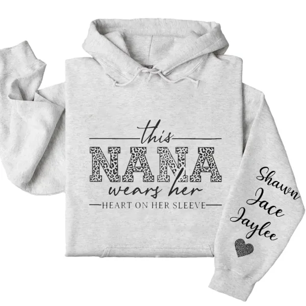 19-3-4.webp This Nana Wears Her Heart on Her Sleeve Hoodie – Personalized Grandma Shirt with Grandkids’ Names, Mother’s Day or Valentine’s Gift