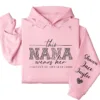 19-4-2.webp This Nana Wears Her Heart on Her Sleeve Hoodie – Personalized Grandma Shirt with Grandkids’ Names, Mother’s Day or Valentine’s Gift