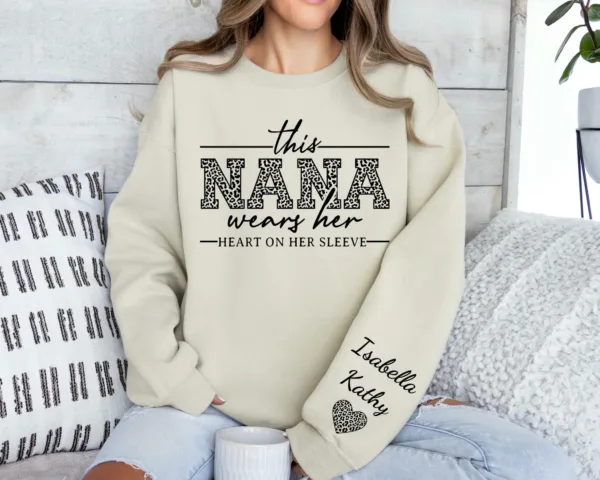 Custom Nana Sweatshirt, With Kids Name On Sleeve, This Nana Wears Her Heart On Her Sleeve