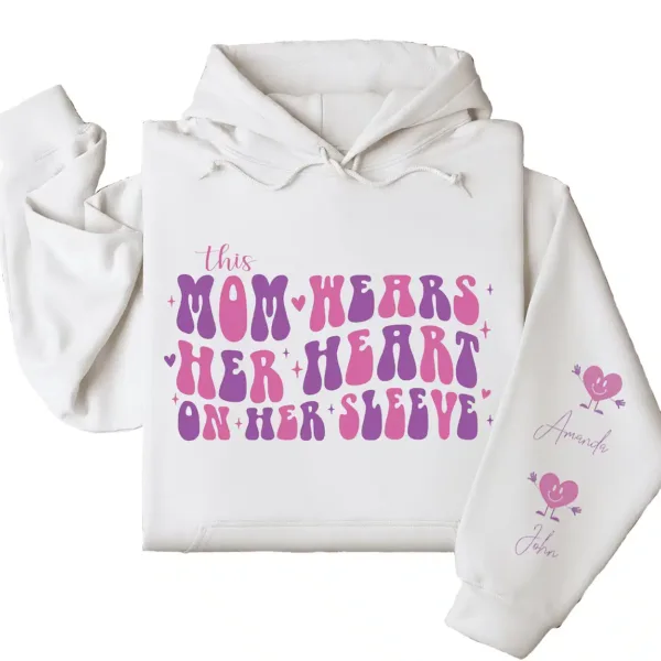 3-1-10.webp This Mama Wears Her Heart on Her Sleeve Hoodie – Custom Mom Shirt with Kids’ Names on Sleeve, Thoughtful Mother’s Day Gift