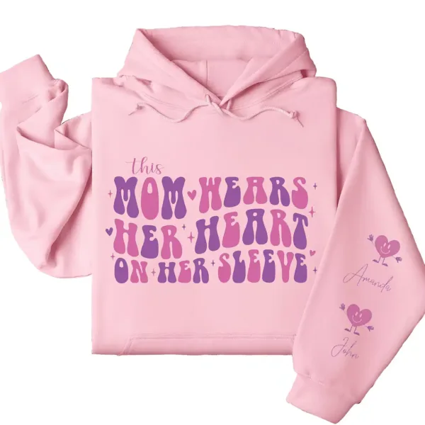 3-3-10.webp This Mama Wears Her Heart on Her Sleeve Hoodie – Custom Mom Shirt with Kids’ Names on Sleeve, Thoughtful Mother’s Day Gift