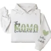 3-3-11.webp This Mama Wears Her Heart on Her Sleeve Hoodie – Custom Hoodie with Kids’ Names, Personalized Mother’s Day Gift for Mama