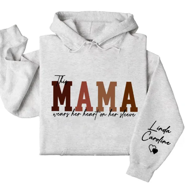 4-4-7.webp Custom This Mama Wears Her Heart On Her Sleeve Hoodie – Personalized Mom Shirt, Mother’s Day Gift for New Moms