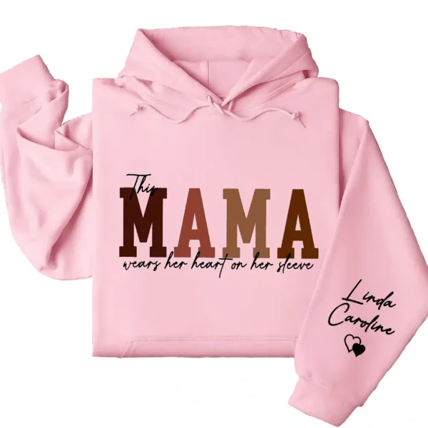 4-5-1.webp Custom This Mama Wears Her Heart On Her Sleeve Hoodie – Personalized Mom Shirt, Mother’s Day Gift for New Moms