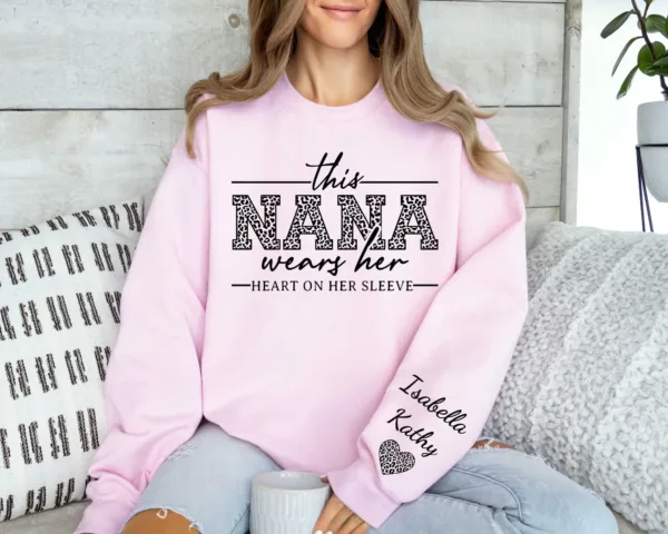 Custom Nana Sweatshirt, With Kids Name On Sleeve, This Nana Wears Her Heart On Her Sleeve