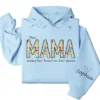 7-2-9.webp This Mama Wears Her Heart on Her Sleeve Hoodie – Floral Hoodie for Mom with Kids’ Names, Cute Personalized Gift Idea