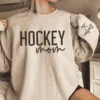 CUSTOM-Hockey-Mom-Sweatshirt-with-Name-on-Sleeve-Ice-Hockey-Mama-Sweater-Personalized-Hockey-Gift-Game-Day-Crewneck-Goalie-Mom-Hoodie-1.png Custom Hockey Mom Sweatshirt with Name on Sleeve, Personalized Mom Sweater, Game Day Shirt, Crewneck, Mothers Day Gift