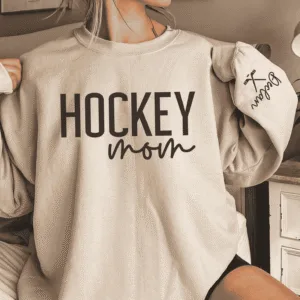 CUSTOM-Hockey-Mom-Sweatshirt-with-Name-on-Sleeve-Ice-Hockey-Mama-Sweater-Personalized-Hockey-Gift-Game-Day-Crewneck-Goalie-Mom-Hoodie-1.png Custom Hockey Mom Sweatshirt with Name on Sleeve, Personalized Mom Sweater, Game Day Shirt, Crewneck, Mothers Day Gift