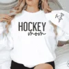 CUSTOM-Hockey-Mom-Sweatshirt-with-Name-on-Sleeve-Ice-Hockey-Mama-Sweater-Personalized-Hockey-Gift-Game-Day-Crewneck-Goalie-Mom-Hoodie34.png Custom Hockey Mom Sweatshirt with Name on Sleeve, Personalized Mom Sweater, Game Day Shirt, Crewneck, Mothers Day Gift