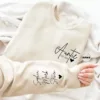 Custom-Auntie-Sweatshirt-2.webp Custom Auntie Sweatshirt, Personalized Aunt Sweatshirt With Nieces Nephews Names On Sleeve, Pregnancy Reveal Outfit, Mothers Day Clothing Gifts