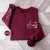 Custom-Auntie-Sweatshirt-4.webp Custom Auntie Sweatshirt, Personalized Aunt Sweatshirt With Nieces Nephews Names On Sleeve, Pregnancy Reveal Outfit, Mothers Day Clothing Gifts