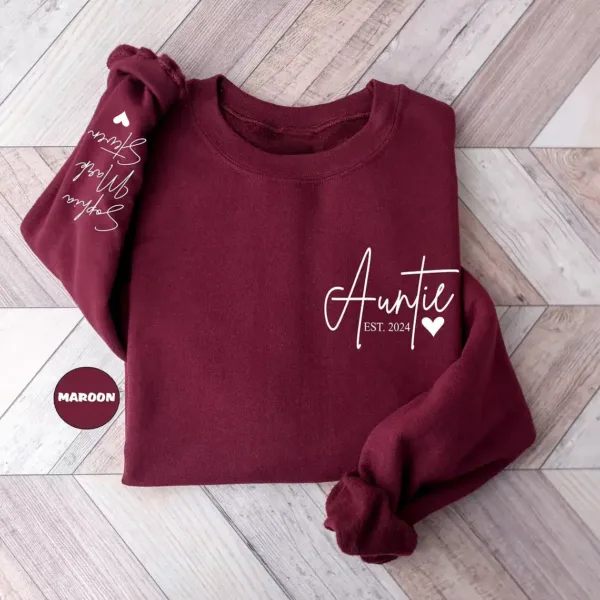 Custom-Auntie-Sweatshirt-4.webp Custom Auntie Sweatshirt, Personalized Aunt Sweatshirt With Nieces Nephews Names On Sleeve, Pregnancy Reveal Outfit, Mothers Day Clothing Gifts