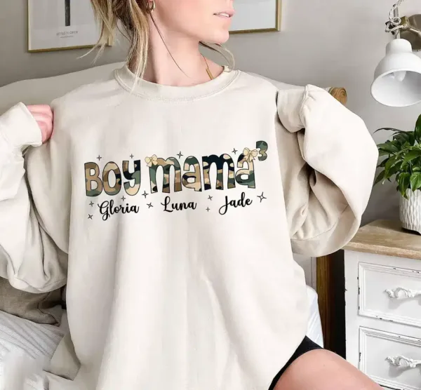Custom-Boy-Mama-Camo-1.webp Custom Boy Mama Camo, Camo Coquette Bow Sweatshirt, Boy Mom Name Kids Crewneck, The Best Mother's Day Gift