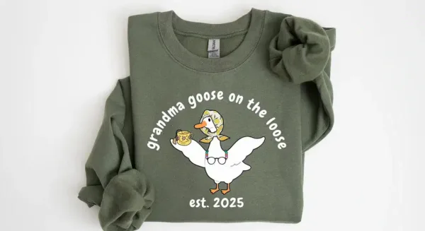 Custom-Grandma-Goose-On-The-Loose-Shirt-2.webp Custom Grandma Goose On The Loose Sweatshirt, Cute Grandma , Funny Goose Gift, New Grandma Crewneck, Mothers Day Gift, Funny Grandma, Gigi Sweater