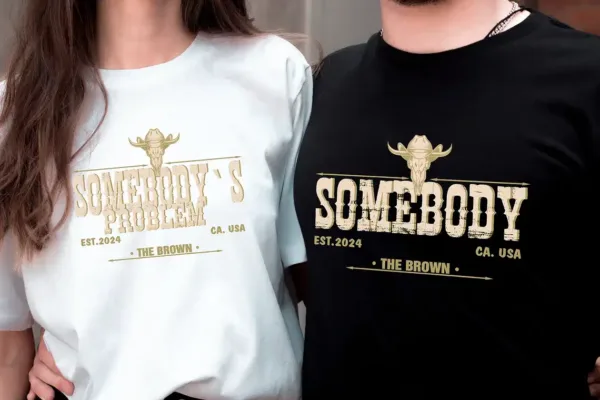 Custom-Somebodys-Problem-Shirts-2.webp Somebody's Problem Matching Couple Tee, Western Couples Shirt, Gifts for Couples, Country Music Shirt, Country Couples Shirt, Cowgirls Tee