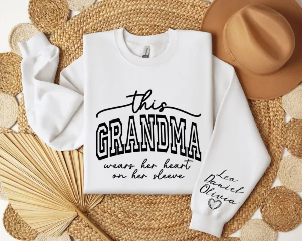 Custom Sweatshirt for Grandma, Christmas Gift for Grandma, I Wear My Heart On My Sleeve, Grandma Sweatshirt with Grandchildren Name on Sleeve
