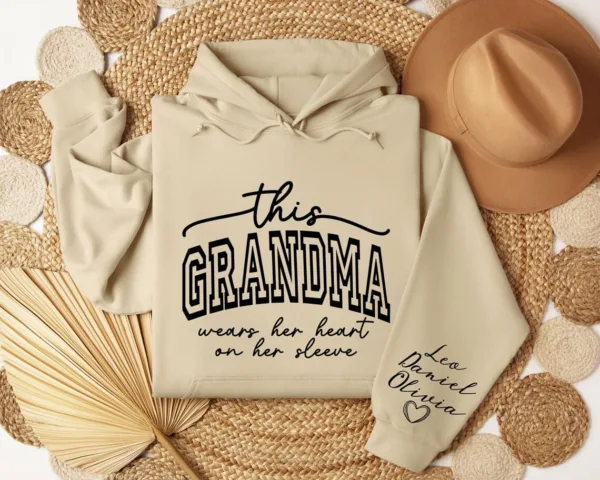 Custom Sweatshirt for Grandma, Christmas Gift for Grandma, I Wear My Heart On My Sleeve, Grandma Sweatshirt with Grandchildren Name on Sleeve