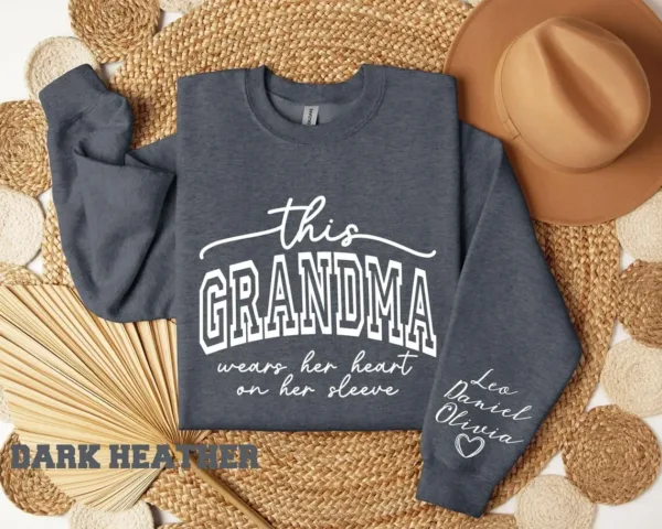 Custom Sweatshirt for Grandma, Christmas Gift for Grandma, I Wear My Heart On My Sleeve, Grandma Sweatshirt with Grandchildren Name on Sleeve