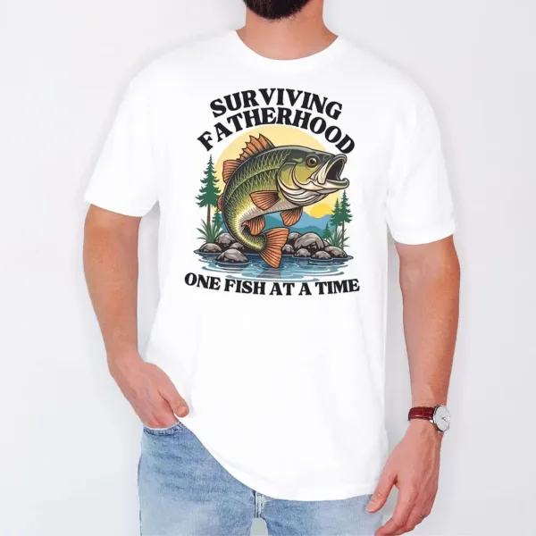 Fatherhood-Fishing-1.webp Fatherhood Fishing T-Shirt, funny Bass Tee, Surviving Fatherhood, Fishing Enthusiast, The Best Father's Day Gift