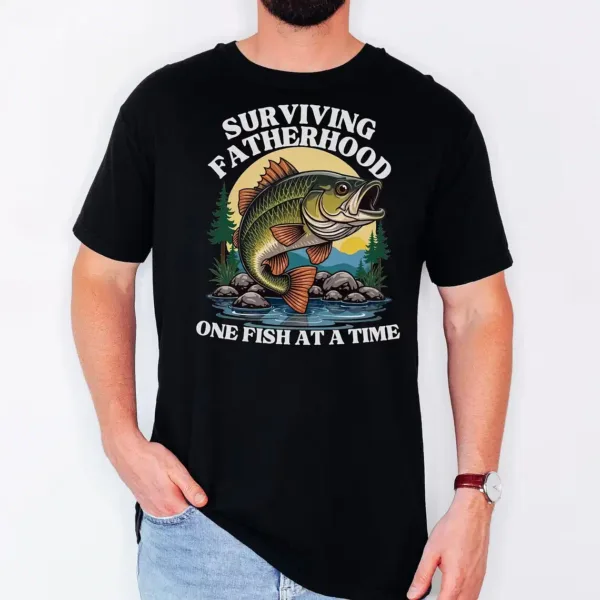 Fatherhood-Fishing-2.webp Fatherhood Fishing T-Shirt, funny Bass Tee, Surviving Fatherhood, Fishing Enthusiast, The Best Father's Day Gift