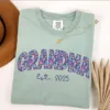 Floral-Grandma-Shirt-Grandma-Est-2025-Shirt-1.webp Floral Grandma T-Shirt, Grandma Est 2025 Shirt, Comfort Colors Grandma Shirt, Gift for Grandma, Pregnancy Announcement, Mother's Day, Grandma