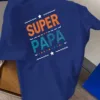 Graphic-Design-Featuring-1.webp Graphic Design Featuring Super Dad on a Men's Short-Sleeve Crew Neck T-Shirt, a Comfortable And Lightweight Casual Top Perfect for Summer