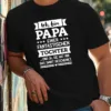 German Quote T-Shirt - Papa Humorous Design, Black with White Text & Star Decorations