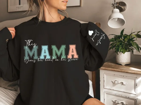 Personalized-This-Mama-Wears-Her-Heart-On-Her-Sleeve-Hoodie-Personalized-Mom-Sweatshirt-With-Kids-Names-Cute-Momma-Mothers-Day-Gifts-1.jpg Personalized This Mama Wears Her Heart on Her Sleeve Sweatshirt, Custom Kids Name on Sleeve, Mothers Day Gift, Gift for Mom Sweatshirt, Mom Life