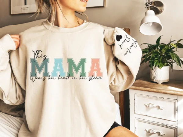 Personalized-This-Mama-Wears-Her-Heart-On-Her-Sleeve-Hoodie-Personalized-Mom-Sweatshirt-With-Kids-Names-Cute-Momma-Mothers-Day-Gifts-4.jpg Personalized This Mama Wears Her Heart on Her Sleeve Sweatshirt, Custom Kids Name on Sleeve, Mothers Day Gift, Gift for Mom Sweatshirt, Mom Life