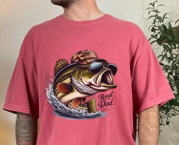 Reel-Cool-Dad-Shirt-1.webp Reel Cool Dad, Bonus Dad, Fishing Dad T-Shirt, Father's Day Shirt, Camouflage Reel Cool Dad, Camo Fishing Rod Shirt, Gift for Dad