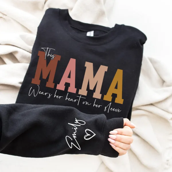 This-Mama-Wears-Her-Heart-on-Her-Sleeve-Sweatshirt-Personalized-Kids-Name-on-Sleeve-Mothers-Day-Gift-Gift-for-Mom-Sweatshirt-Mom-Life-3.png Personalized This Mama Wears Her Heart on Her Sleeve Sweatshirt, Custom Kids Name on Sleeve, Mothers Day Gift, Gift for Mom Sweatshirt, Mom Life