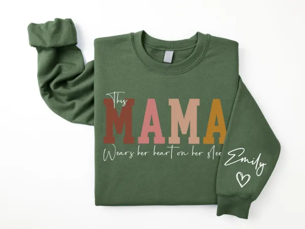 This-Mama-Wears-Her-Heart-on-Her-Sleeve-Sweatshirt-Personalized-Kids-Name-on-Sleeve-Mothers-Day-Gift-Gift-for-Mom-Sweatshirt-Mom-Life-4.png Personalized This Mama Wears Her Heart on Her Sleeve Sweatshirt, Custom Kids Name on Sleeve, Mothers Day Gift, Gift for Mom Sweatshirt, Mom Life