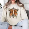 Skeleton Ribcage Pumpkin Halloween Sweatshirt Skeleton Ribcage Pumpkin Halloween Sweatshirt