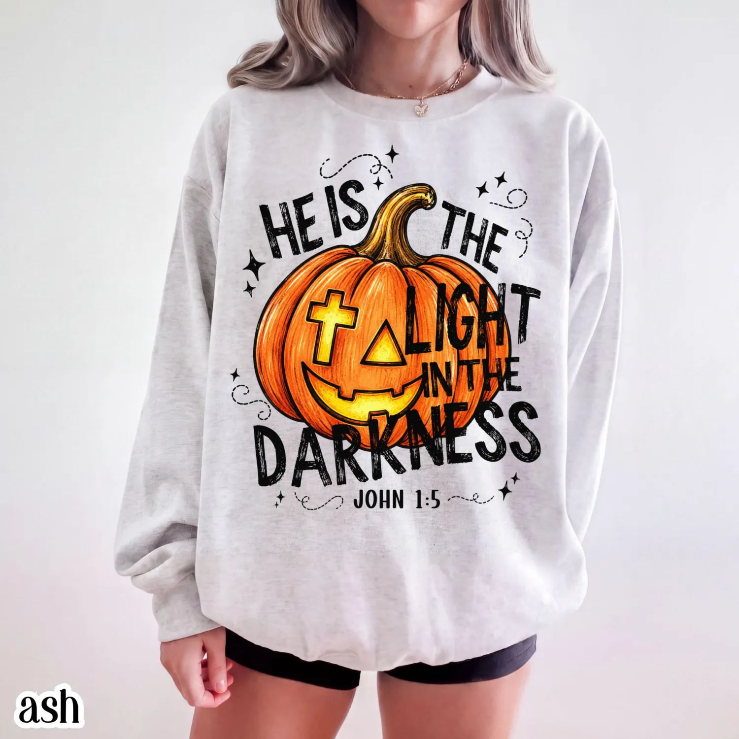 He Is The Light in the Darkness Christian Halloween Sweatshirt